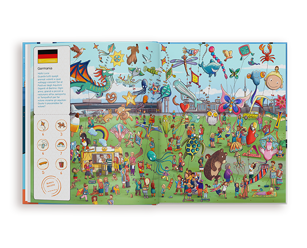 Un'illustrazione animata di un libro cerca-e-trova per bambini aperto. La doppia pagina mostra un festival all'aperto affollato e vivace in un prato, con molte persone che fanno volare aquiloni grandi e colorati a forma di animali e oggetti. All'estrema sinistra, una colonna bianca include la bandiera della Germania, un testo descrittivo del festival in quel paese e un elenco di oggetti da trovare con i relativi numeri.